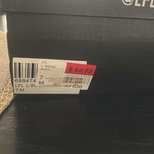 Black women’s dress shoe with tassel